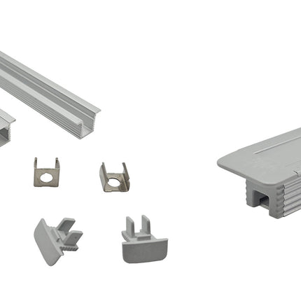 Silver micro recessed LED profile with accessories. 8mm x 8mm recessed LED profile with end caps completed.