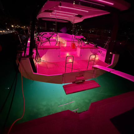 RGBCCT IP65 COB LED strip mounted within bespoke yacht design (underside cover/canopy). Providing a seamless, no dot visual effect in magenta. 