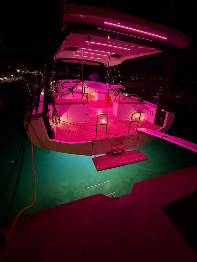 RGBCCT IP65 COB LED strip mounted within bespoke yacht design (underside cover/canopy). Providing a seamless, no dot visual effect in magenta. 
