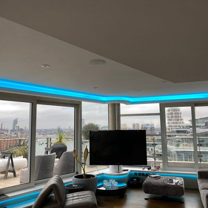 London city view apartment with cyan illuminated curved cove