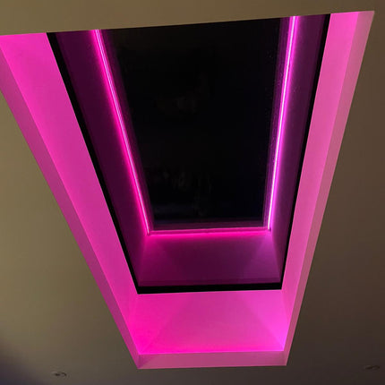 Sky light lit in hot pink. RGBW No Dot COB LED Tape Light. 24V.